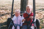 Tanner and his sister Sydney riding in their go-cart 1999